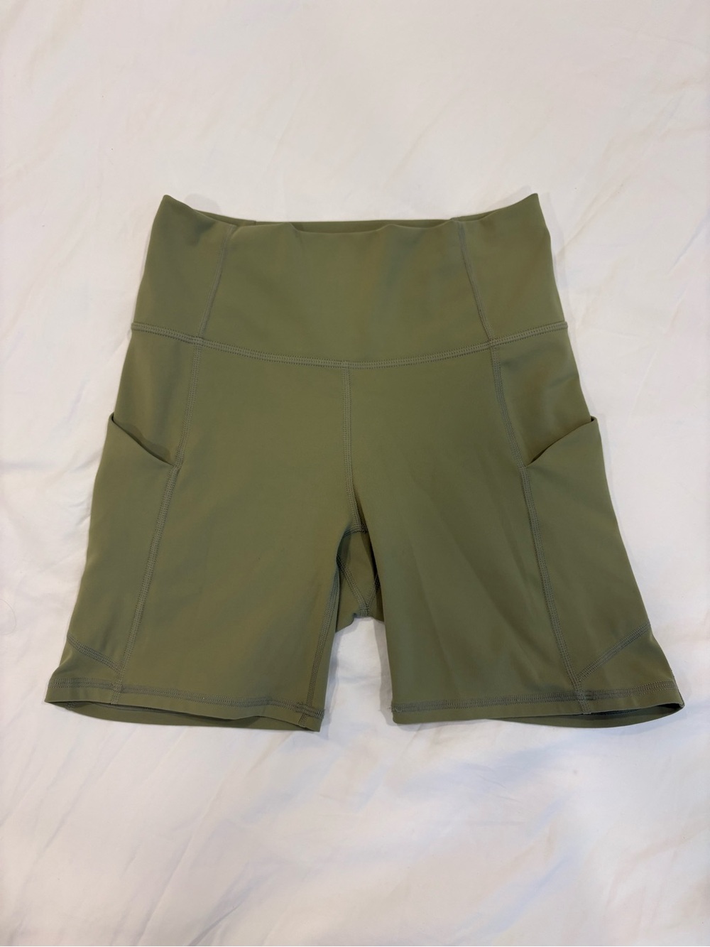 Fabletics Olive Green High-Rise Bike Shorts with Side Pockets